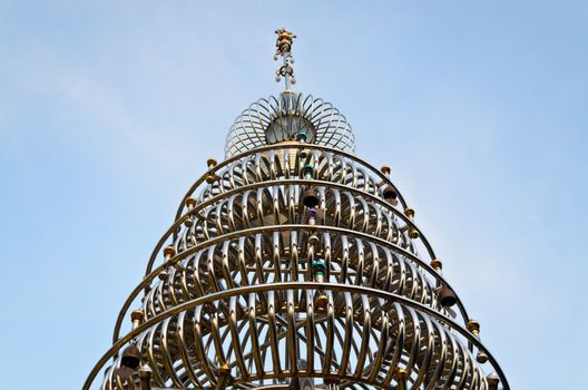 Stainless steel pagoda with blue sky at Hatyai ,Thailand