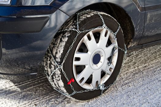 a Car with snow chains 