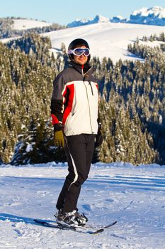 portrait of skiers on the slopes in a sunny day