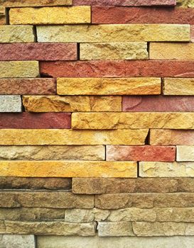 Colorful cut stone wall