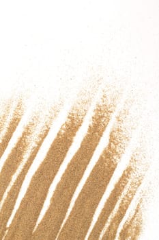 closeup of sand on a white for background or backdrop use