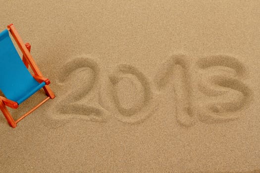 vacation background with sun lounger and text 2013