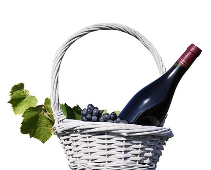image shows a bottle of red wine in a traditional basket with grapes