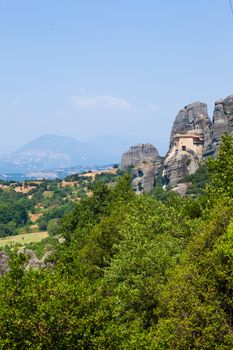 Meteora. Famous Greek Christian monastery on the rock. Greece. Vertical view.