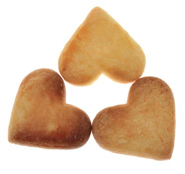 Three heart-shaped cookies isolated against a white background.