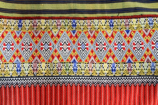 Closeup texture of thai style fabric weave hand-woven