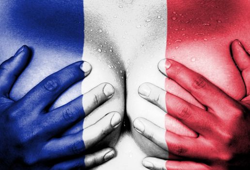 Sweaty upper part of female body, hands covering breasts, flag of France