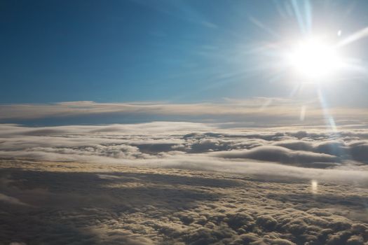 bright sun over the clouds