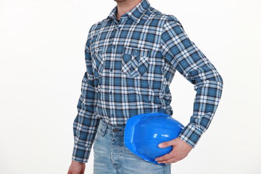 Worker holding a hard hat