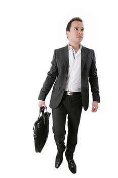 Portrait of a business man carrying a suitcase on white background