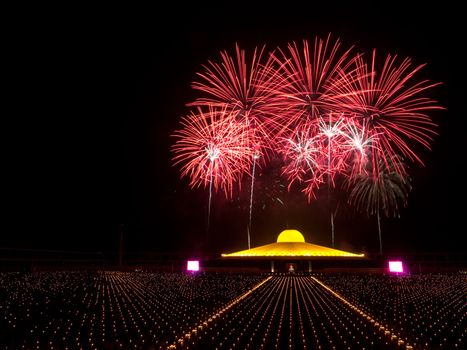 The closing ceremony with candles and fireworks at Wat Dhammakaya after 1,128 monks have wandered 460km through Bangkok and surroundings on January 27, 2013 in Pathum Thani, Thailand.