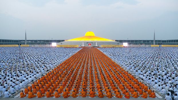 PATHUM THANI - JANUARY 27: The final meditation at Wat Dhammakaya after 1,128 monks have wandered 460km through Bangkok and surroundings on January 27, 2013 in Pathum Thani, Thailand.