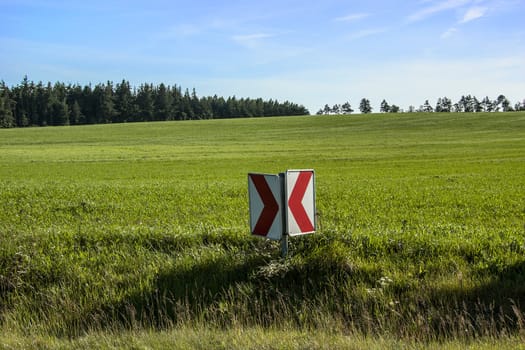 traffic sign in a curve in denmark