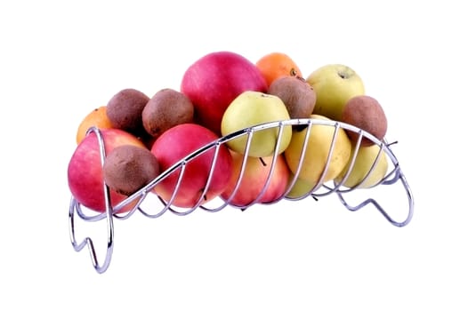 A variety of fruits in a metal vase for fruit on a white background