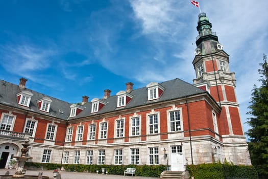 Hvedholm castle slot landmark fairy tale castle in Funen Denmark view of the main building