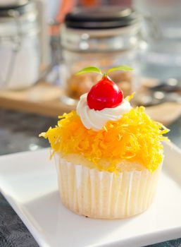 gold egg yolks thread with cherry and cream  cake, thai dessert 
