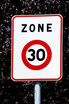 panel of speed limit at the entrance of a French village