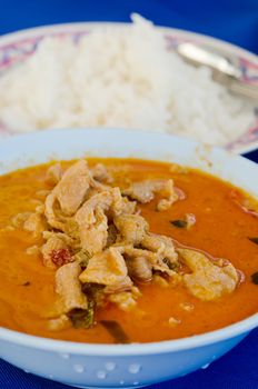  pork in ground peanut-coconut cream curry served with rice