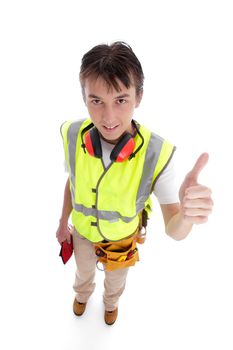 A positive teen trainee apprentice builder, carpenter, construction worker smiling and showing a thumbs up hand sign.  White background.