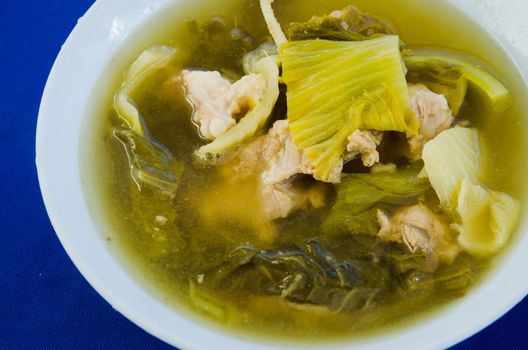 clear soup with  pork and pickled  vegetables