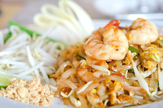 close up stir fry noodles with shrimp , egg  and vegetable 