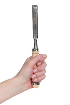 A hand holding a chisel.