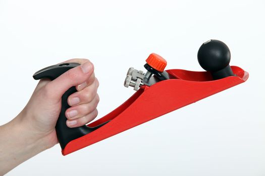 Close-up shot of a hand-held plane