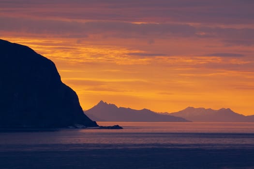 Midnight sun on Lofoten islands in Norway during summer polar day