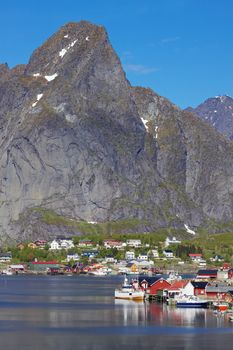Scenic town of Reine on Lofoten islands in Norway, popular tourist destination
