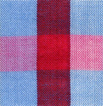 Close up red and blue square fabric pattern background 