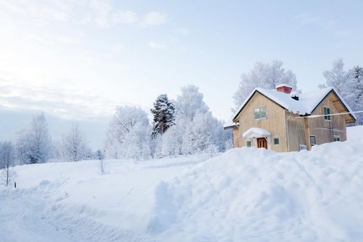 Winter landscape with house at Kiruna Sweden Lapland