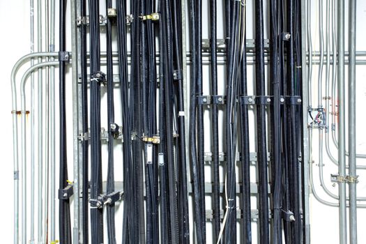 Communication and electrical wire on wall