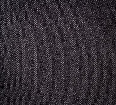 Black fabric texture. Clothes background. Close up