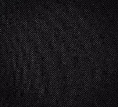 Black fabric texture. Clothes background. Close up