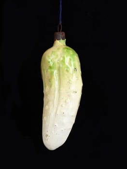 Vintage Christmas  ornament  cucumber isolated on black background