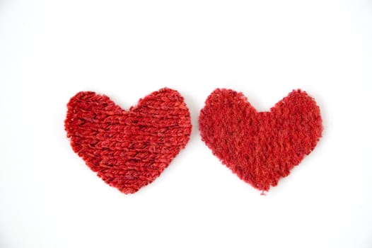 two red hearts on white background