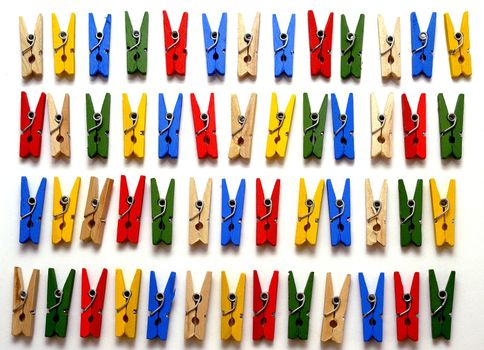 small clothes pegs of colors