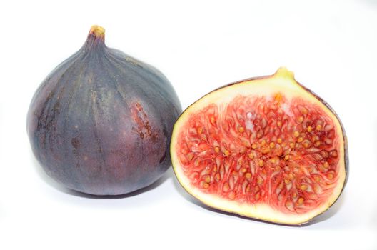 Ripe fig fruits isolated on white background