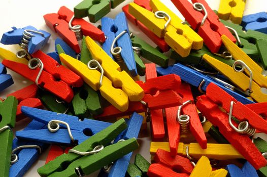 small clothes pegs of colors