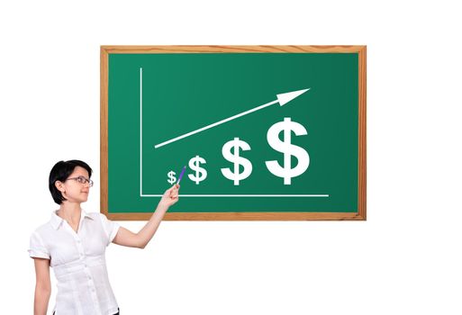 woman pointing to growth dollar on desk