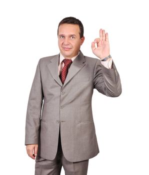 businessman shows agreement on white background