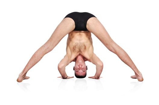 man practicing yoga in position