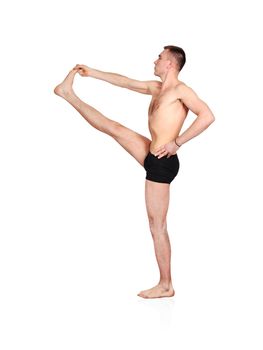 Young man doing yoga exercise  on a white background