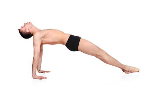 handsome bare chested man doing yoga