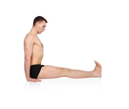 man practicing yoga in position