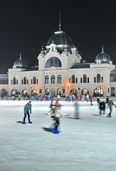 BUDAPEST - DECEMBER 13:Ice skaters in City Park Ice Rink on December 13, 2012 in Budapest, Hungary. Opened in 1870, it is the largest and one of the oldest ice rinks in Europe.