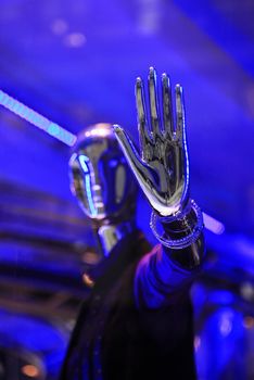 Silver dummies in a show-window of shop
