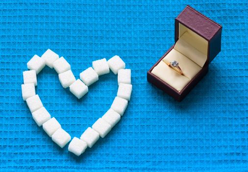 engagement ring and sugar hearts