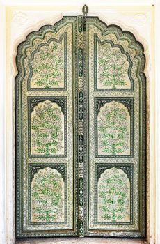 A Hand Painted Old Doors inside Hawa Mahal. Hawa Mahal, the Palace of Winds in Jaipur, Rajasthan, India.