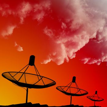 Trouble for radio wave, Satellite dishes on rooftop with cloud in morning sky